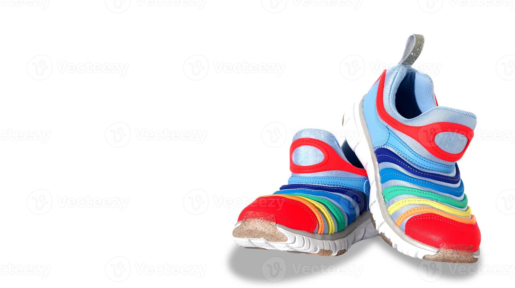 kid colourful shoes on isolated white background photo