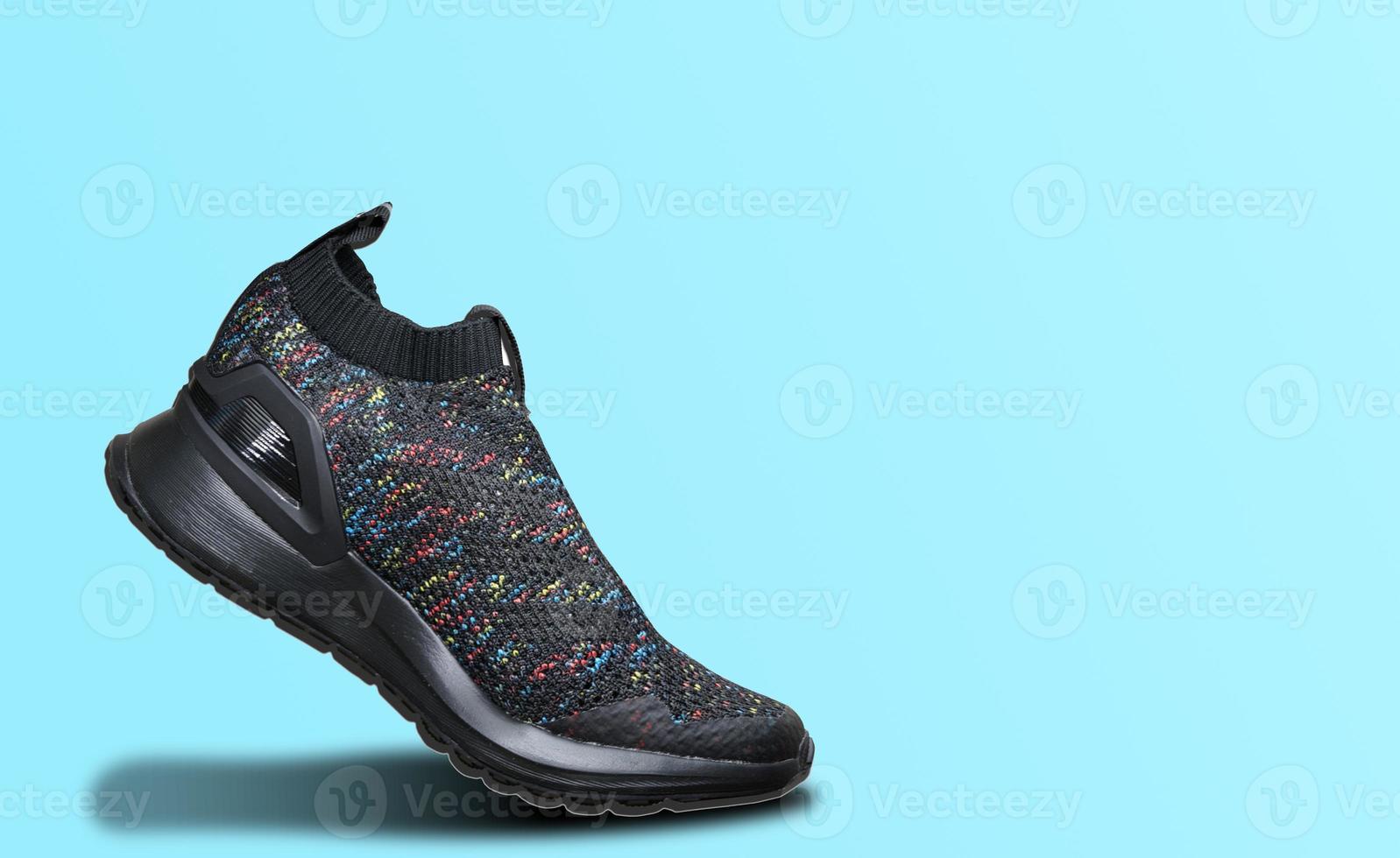 single Running shoe on isolated white background,side view photo