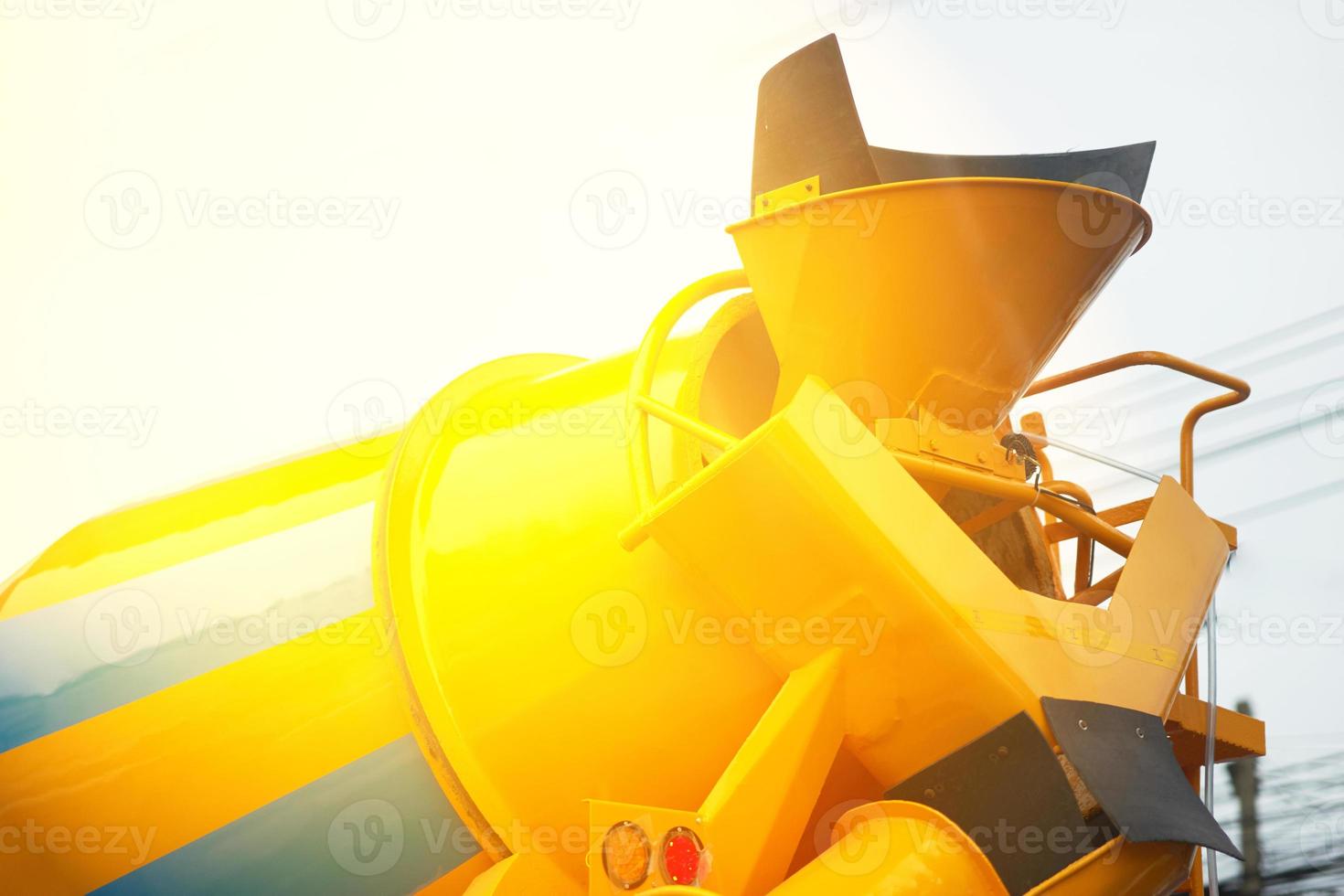 Cement truck in back upward view for golden period resident construction concept photo