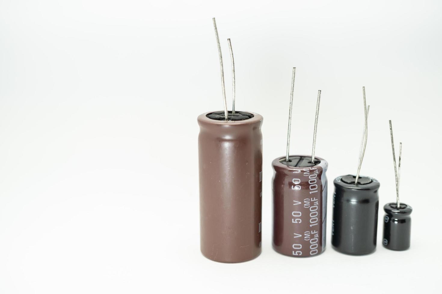 Isolated group of capacitor, used in electronic device. Electronic parts concept. photo