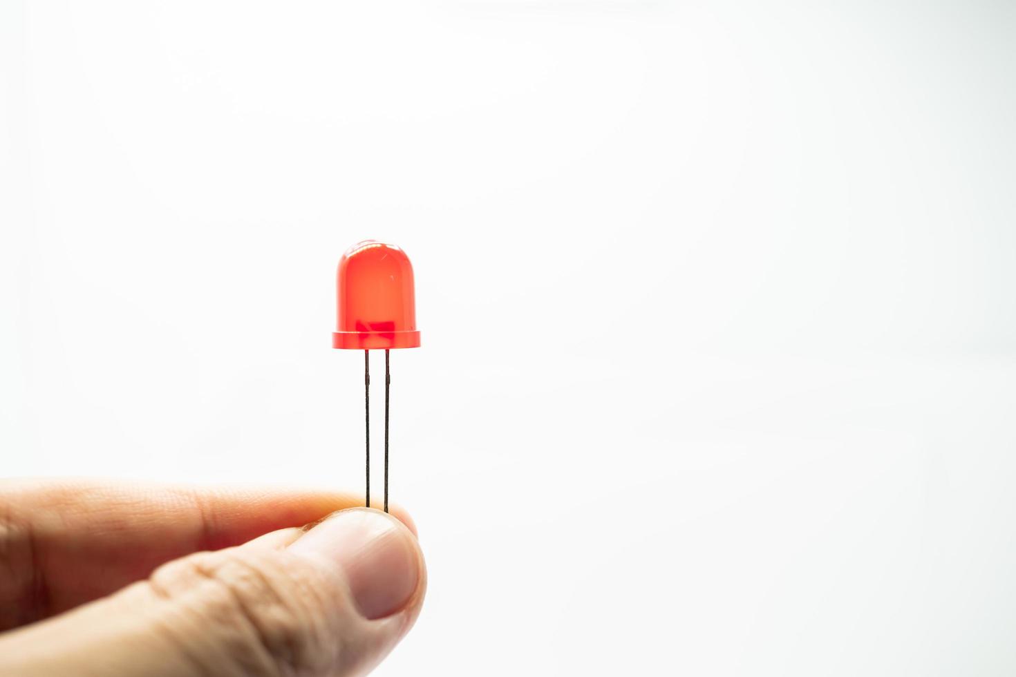 red diode on white background. Red Isolated Diode. photo