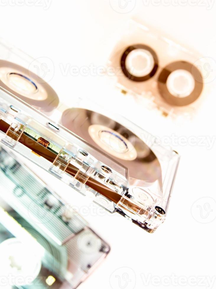 Different sizes of audio cassette tape isolated on white background photo