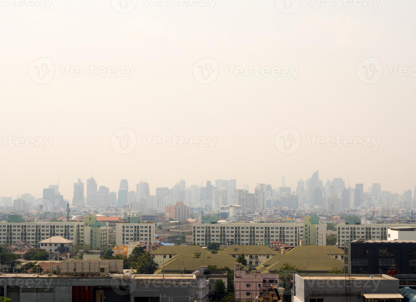 Cityscape urban skyline in the mist or smog. Wide and High view image of Bangkok city in the smog photo