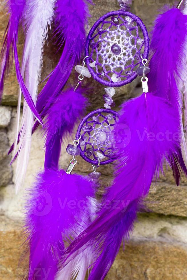 Handmade dream catcher with feathers threads and beads rope hanging photo