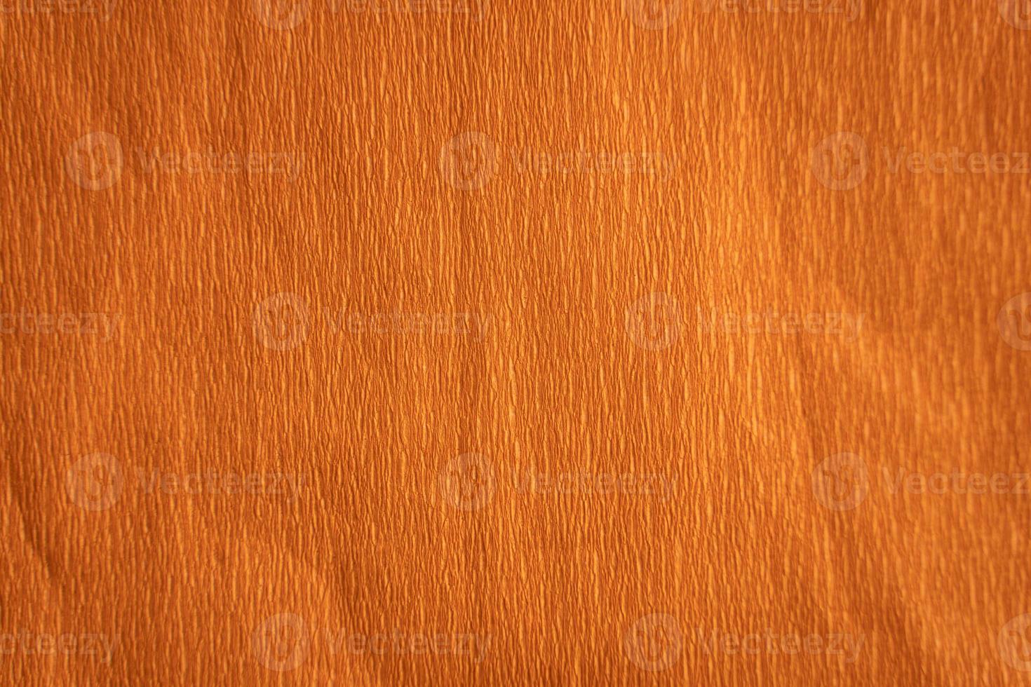 textura de papel crepe naranja foto