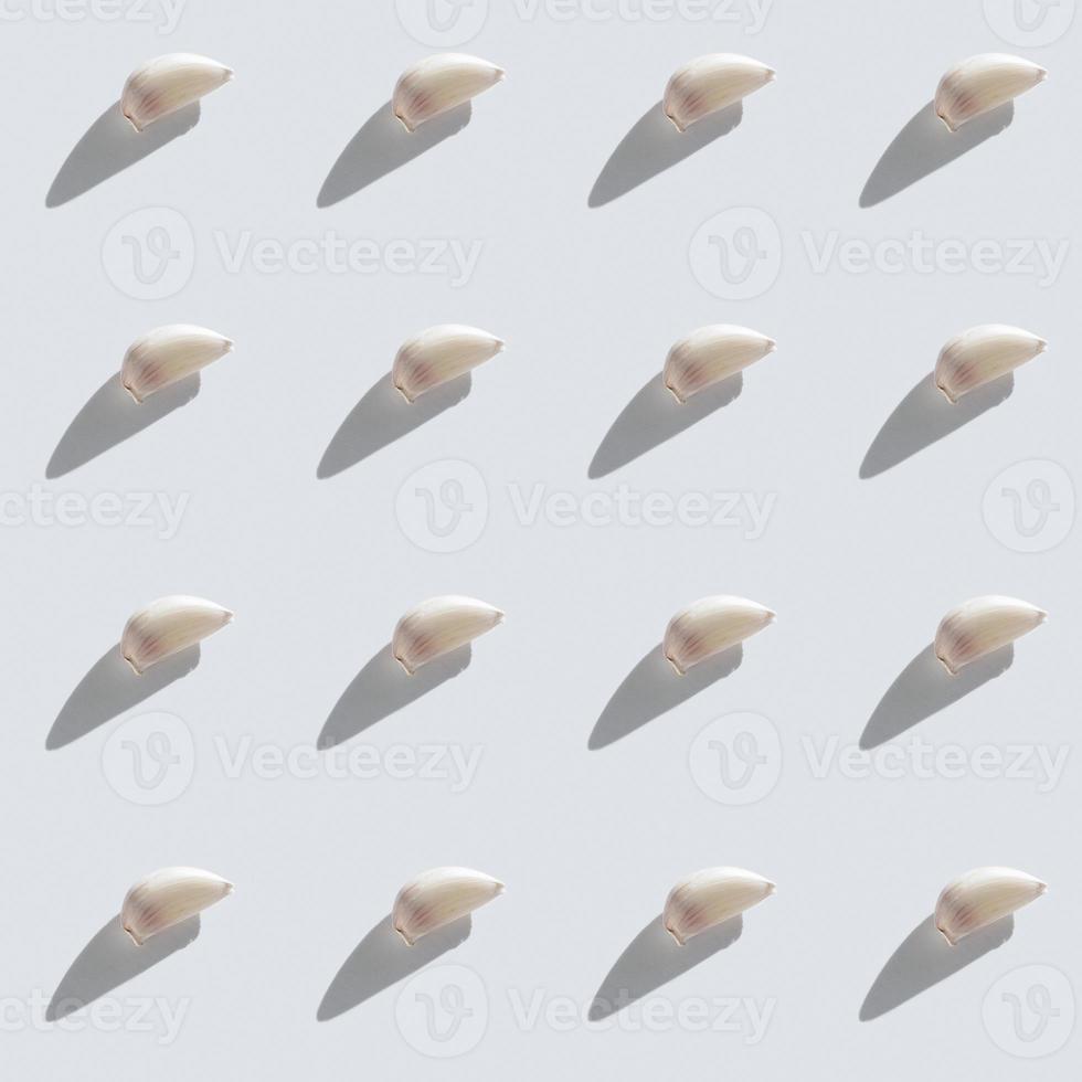 Pattern made of garlic cloves photo