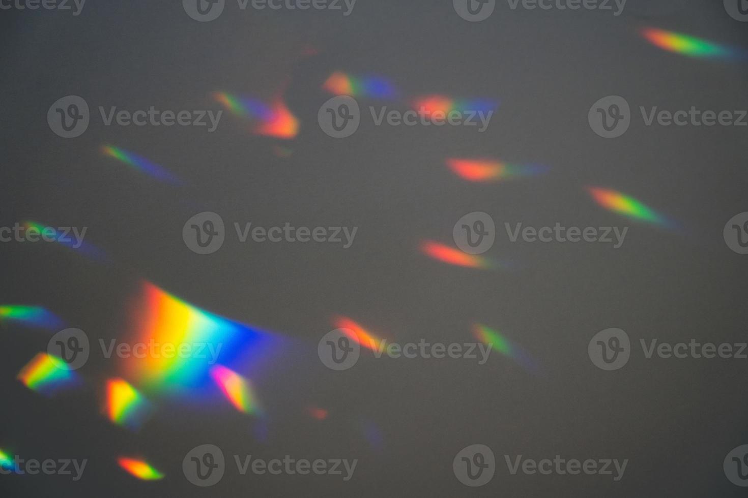 Prism Rainbow Specs on Grey Background Overlay photo