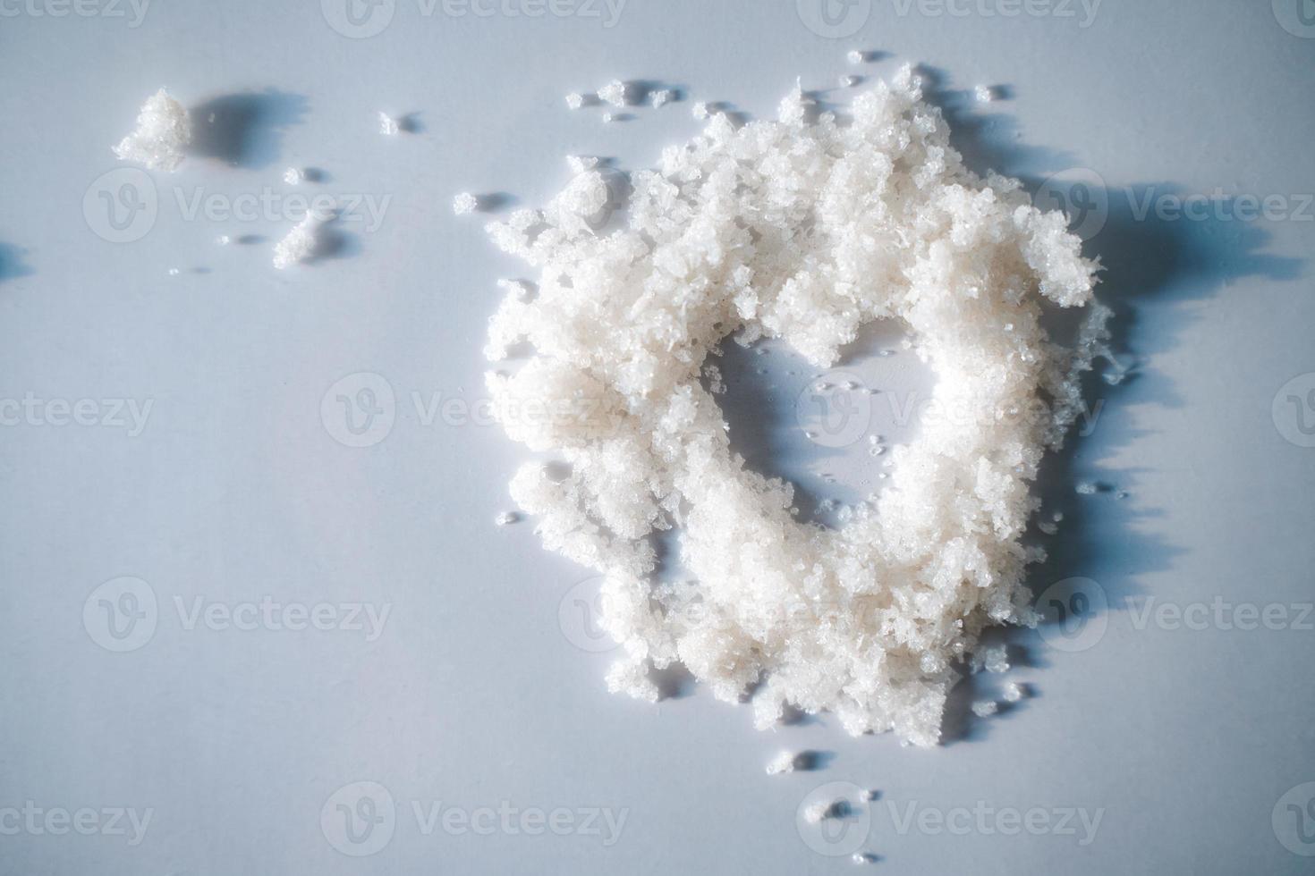 Heart in a white body scrub with bits of shimmer photo