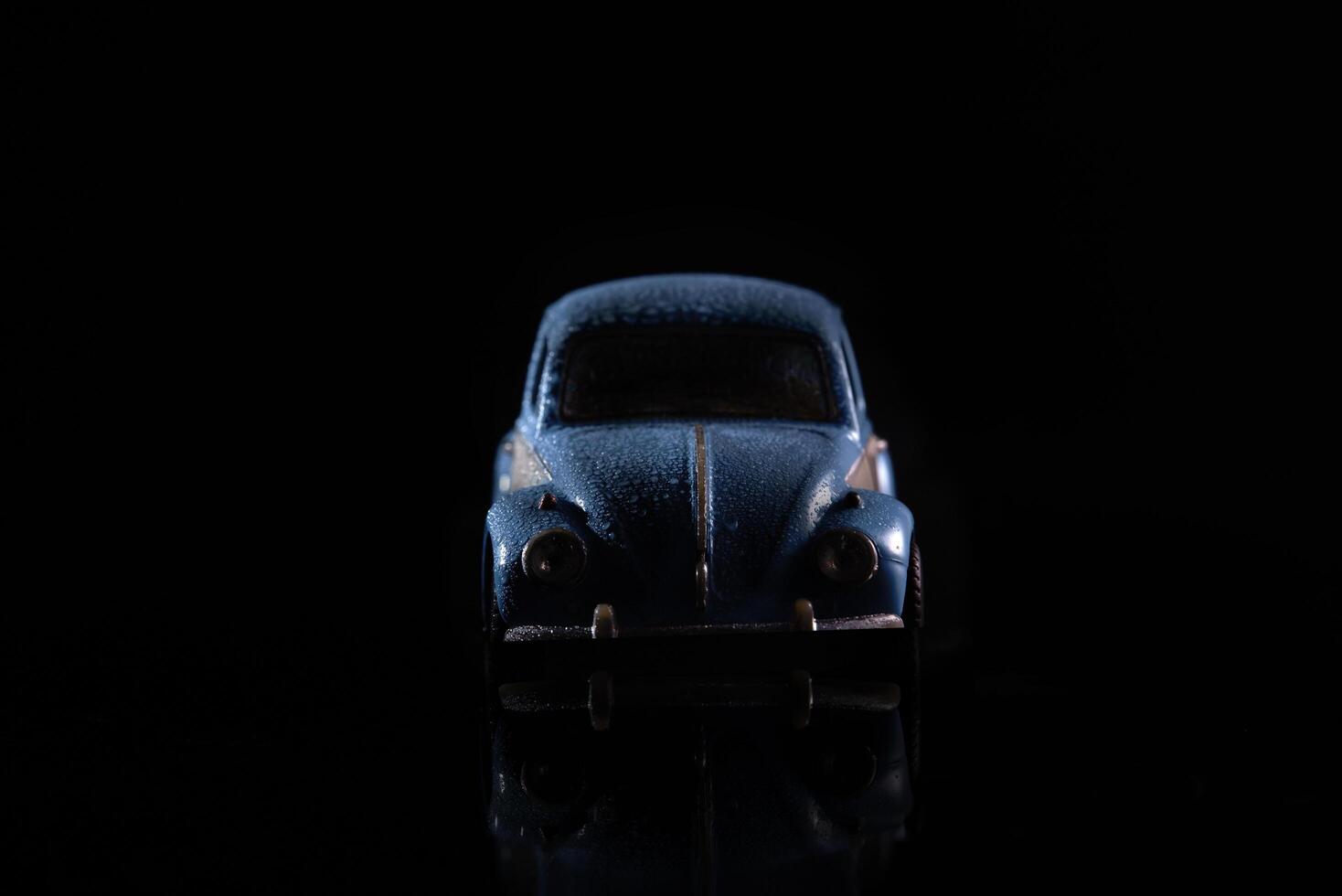 blue car in the shadows photo