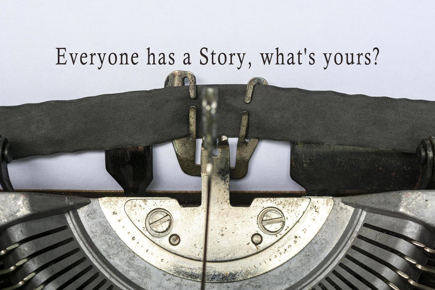 Everyone has a story, what's yours text typed on an old classic typewriter. photo