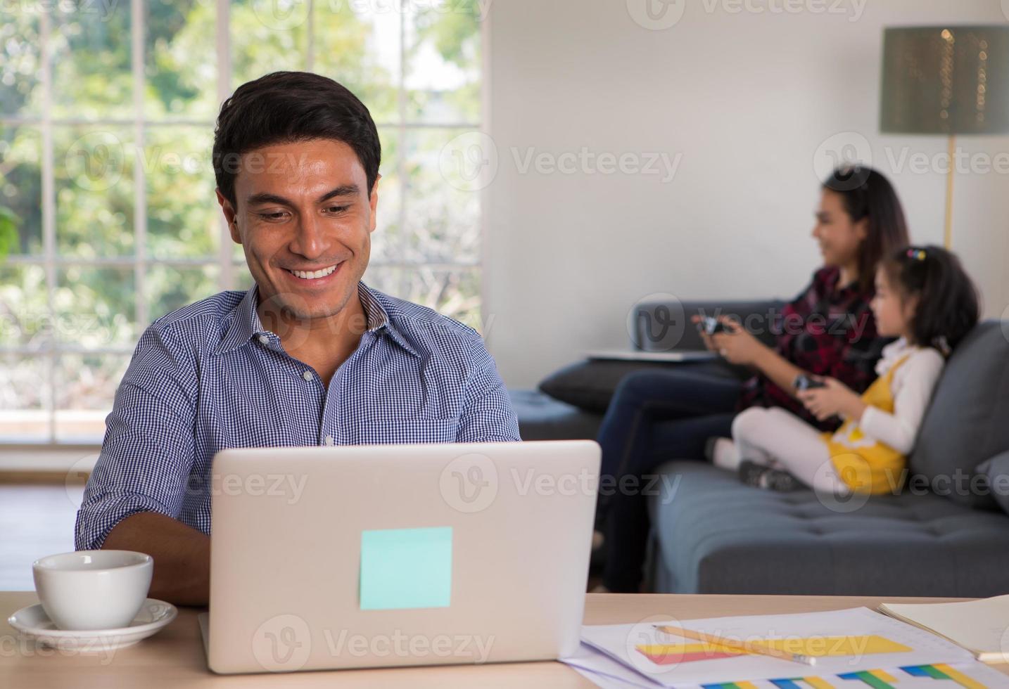 Friends Using Laptop On Sofa Mixed Race Typing Having Photo