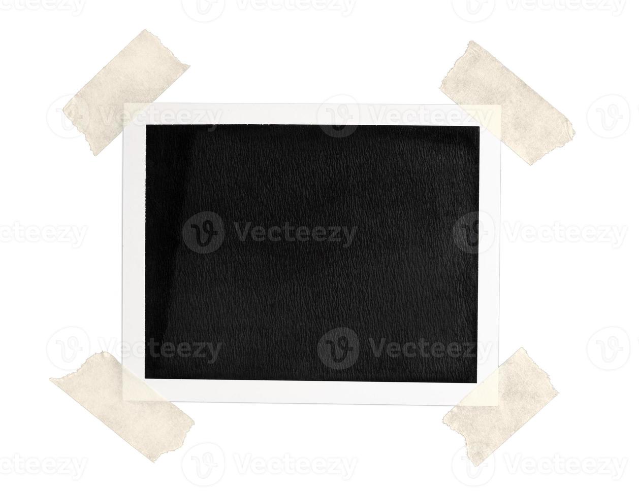 Blank Vintage instant photo frame with brown tape isolated on white background