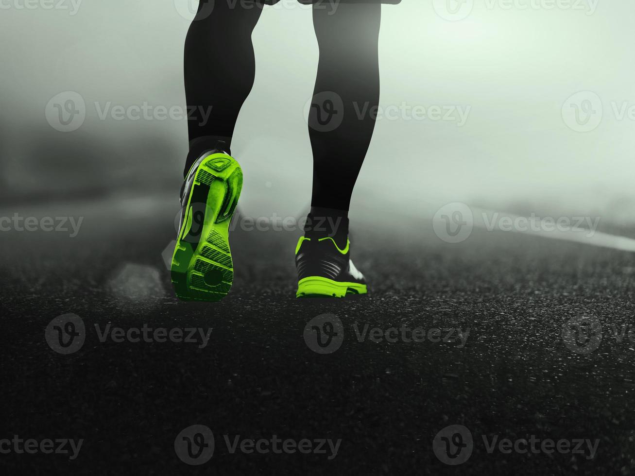 close-up sport shoes of a runner on road for fitness healthy lifestyle. photo