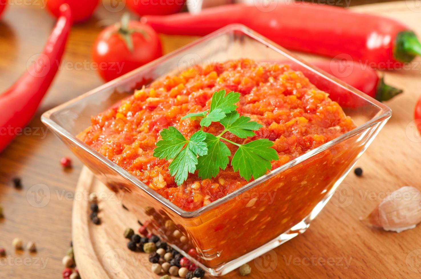 Red hot chili pepper and ingredients for sauce and sauce photo