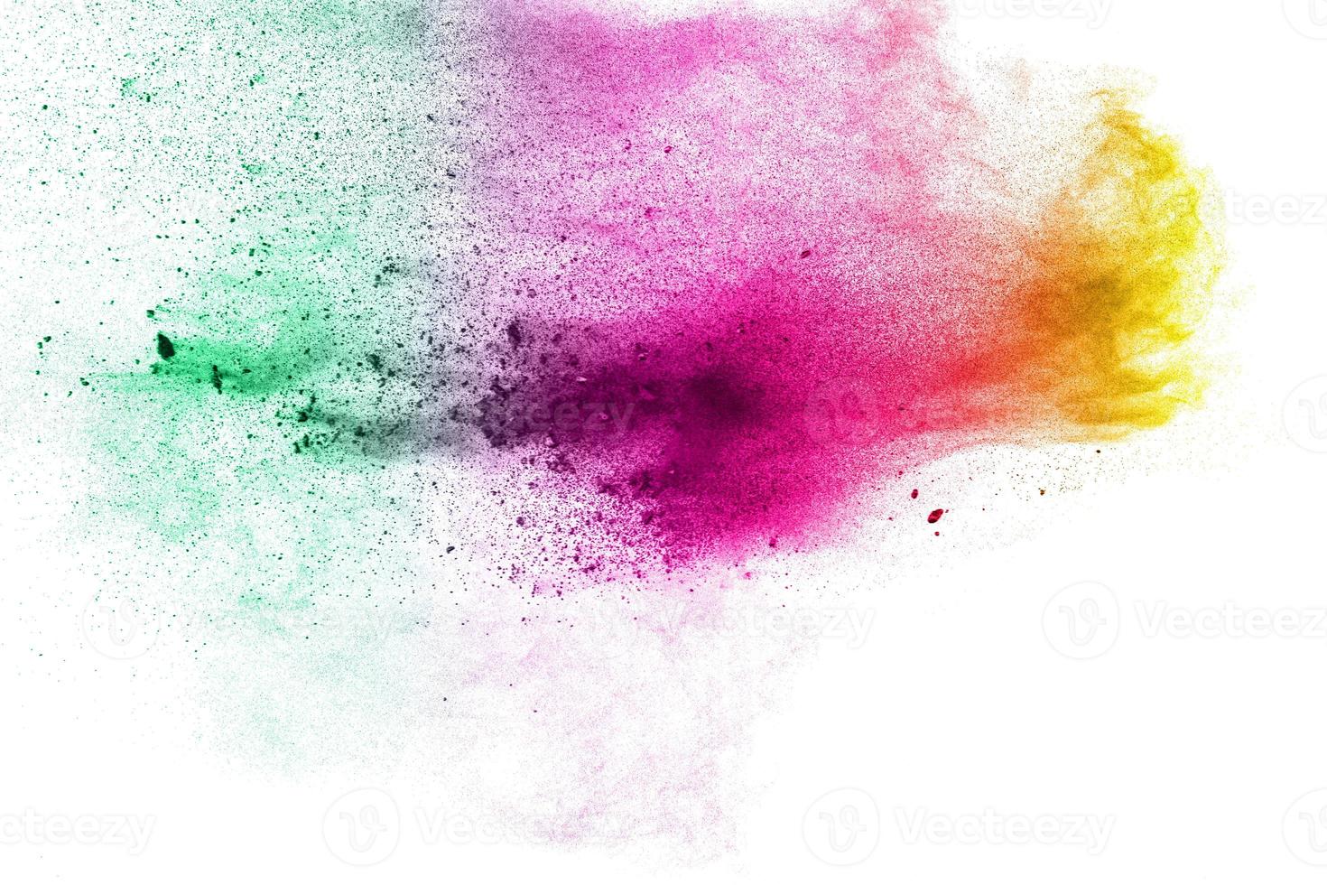 abstract multicolored dust splatter on white background.Freeze motion of color powder explosion on white background. photo