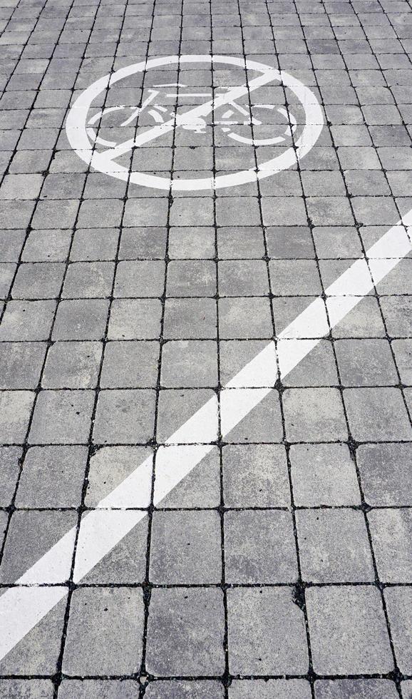 No bike riding lane symbol on the concrete floor in the street photo