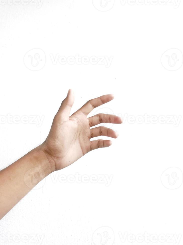 Close-up of hands showing gestures on textured background. photo