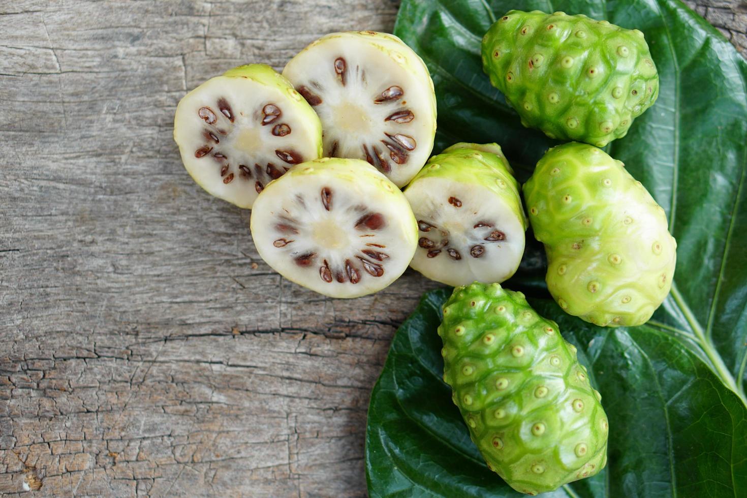 Indian Mulberry is used as a laxative to cure wasting disease and extract the color from it. can be a fabric dye by mixing various parts of salt can change to different colors as needed photo