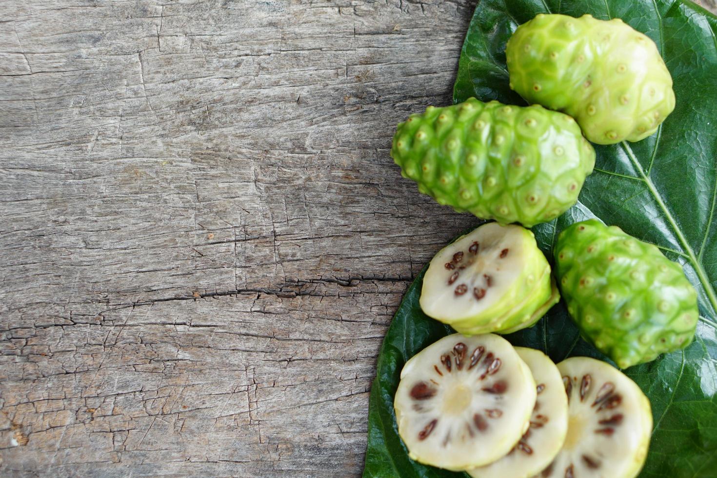 Indian Mulberry is used as a laxative to cure wasting disease and extract the color from it. can be a fabric dye by mixing various parts of salt can change to different colors as needed photo