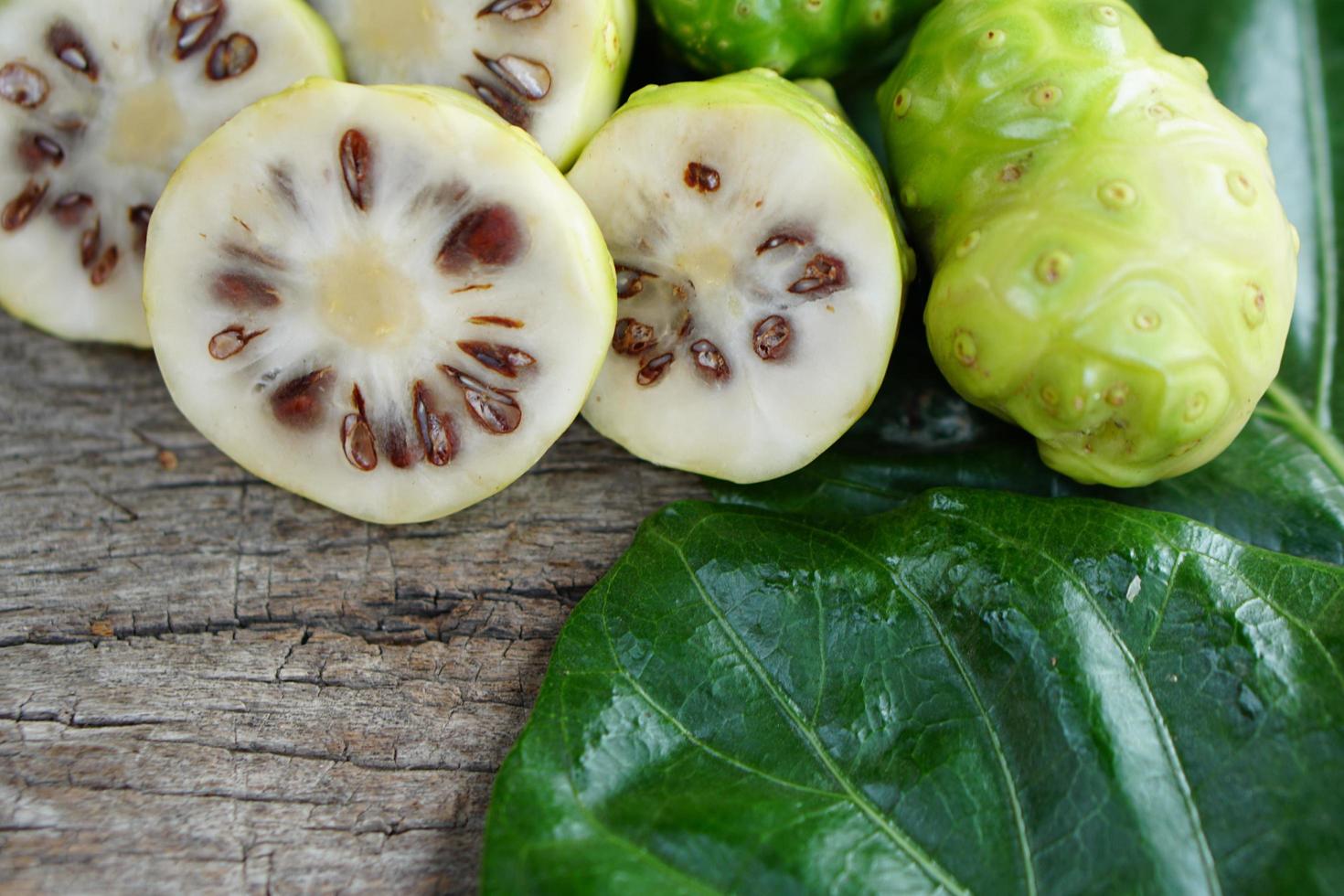 Indian Mulberry is used as a laxative to cure wasting disease and extract the color from it. can be a fabric dye by mixing various parts of salt can change to different colors as needed photo