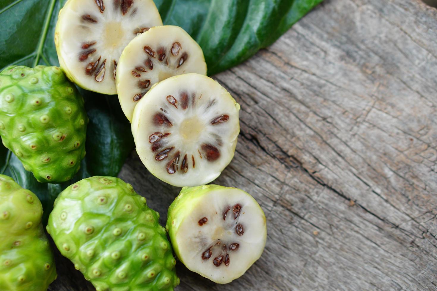 Indian Mulberry is used as a laxative to cure wasting disease and extract the color from it. can be a fabric dye by mixing various parts of salt can change to different colors as needed photo