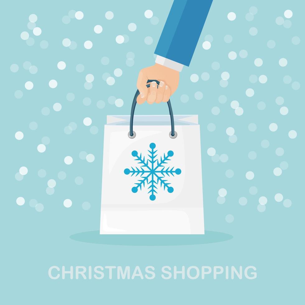 Human hand hold shopping bags with snowflakes. Christmas, new year sale. Vector design
