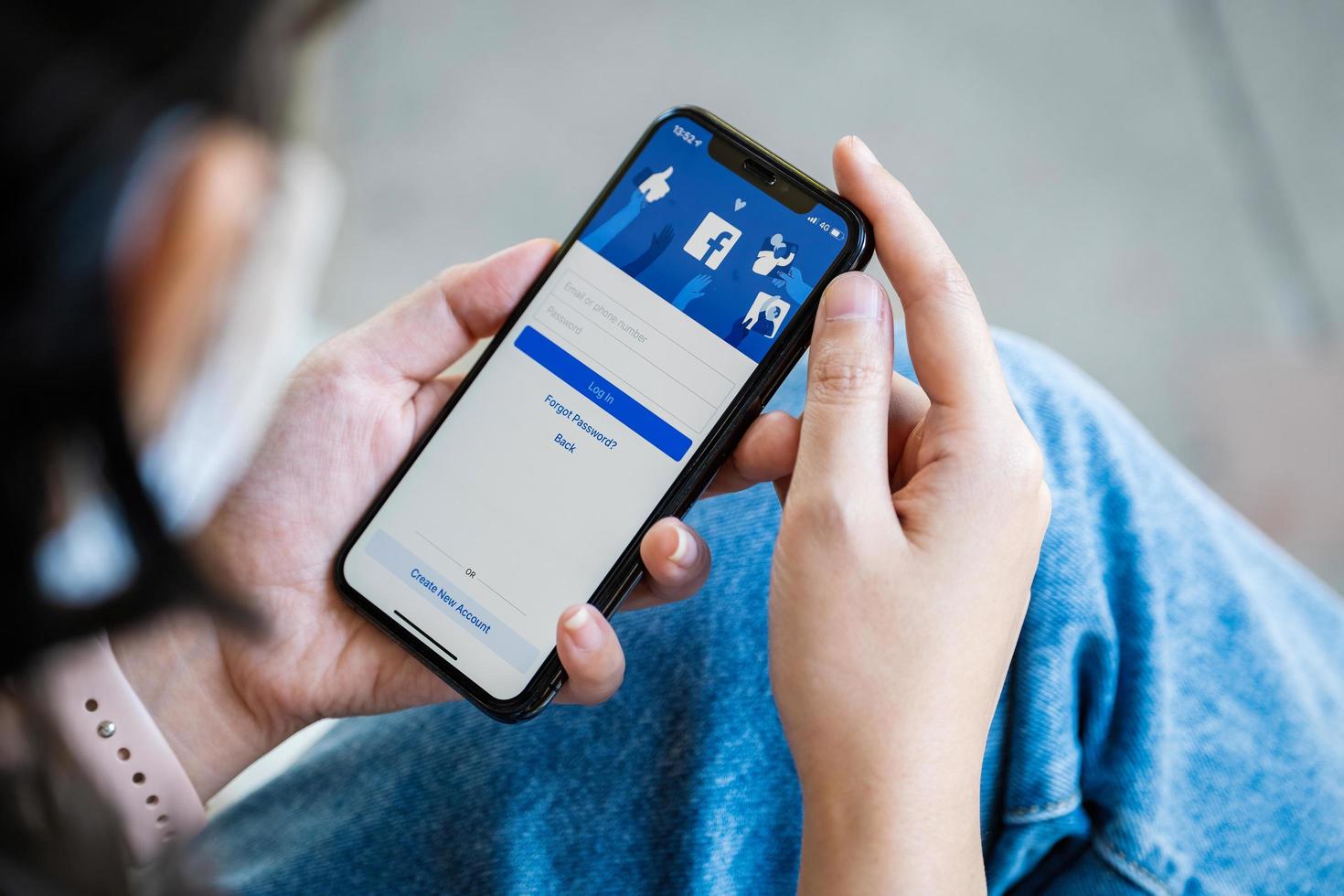 Chiang Mai Thailand. NOV  28, 2021. Woman holds  smart phone with facebook application on the screen. facebook is a photo-sharing app for smartphones. photo