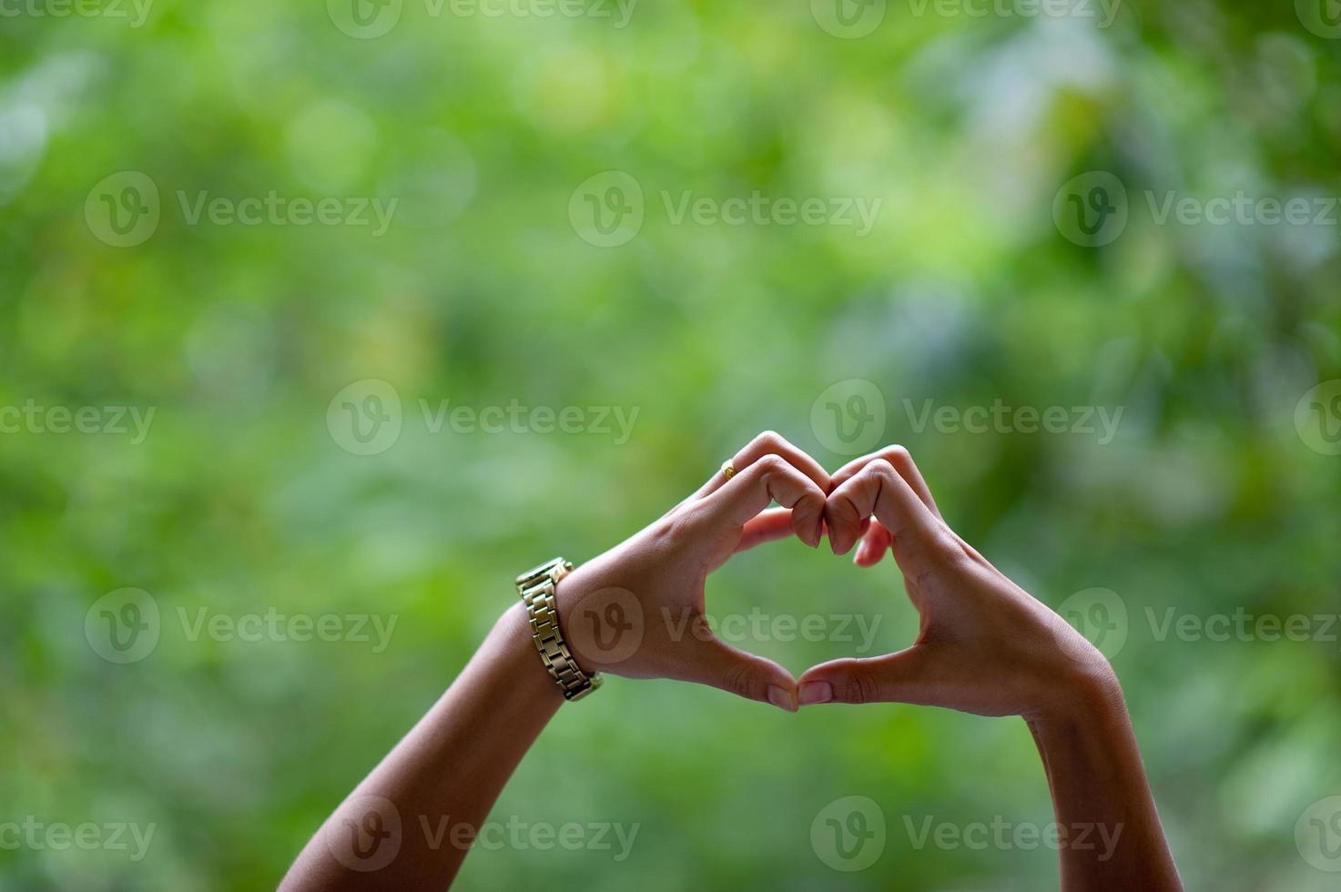 Hands and hearts, hands that show love for each other on the day of love. photo