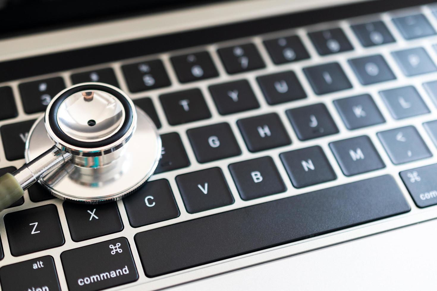 Stethoscope on the computer. computer or data analysis concept photo