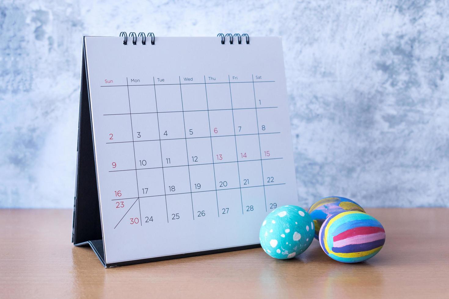Happy Easter Calendar with an easter egg. Easter festive holidays concept. photo