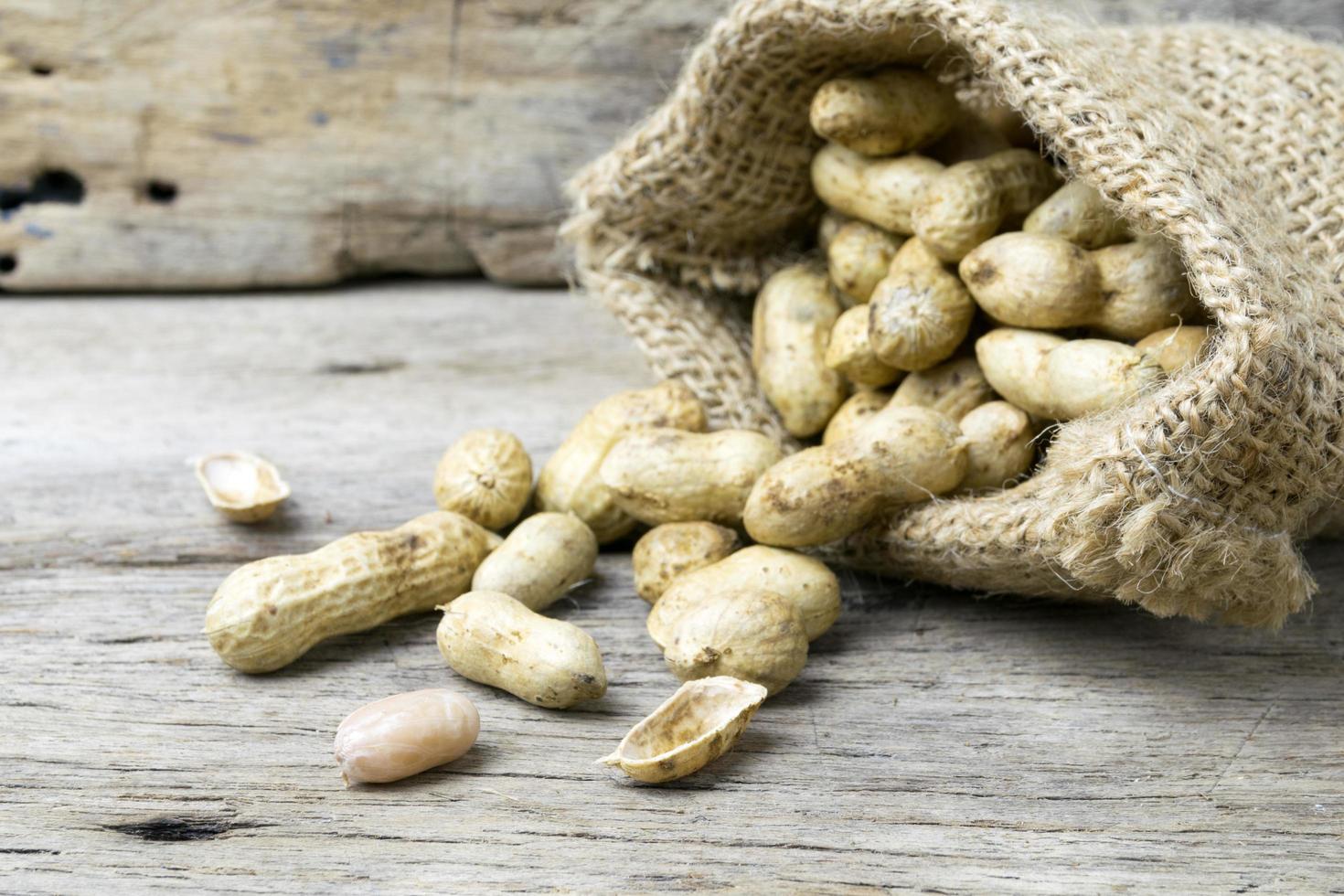 peanut on wooden background photo