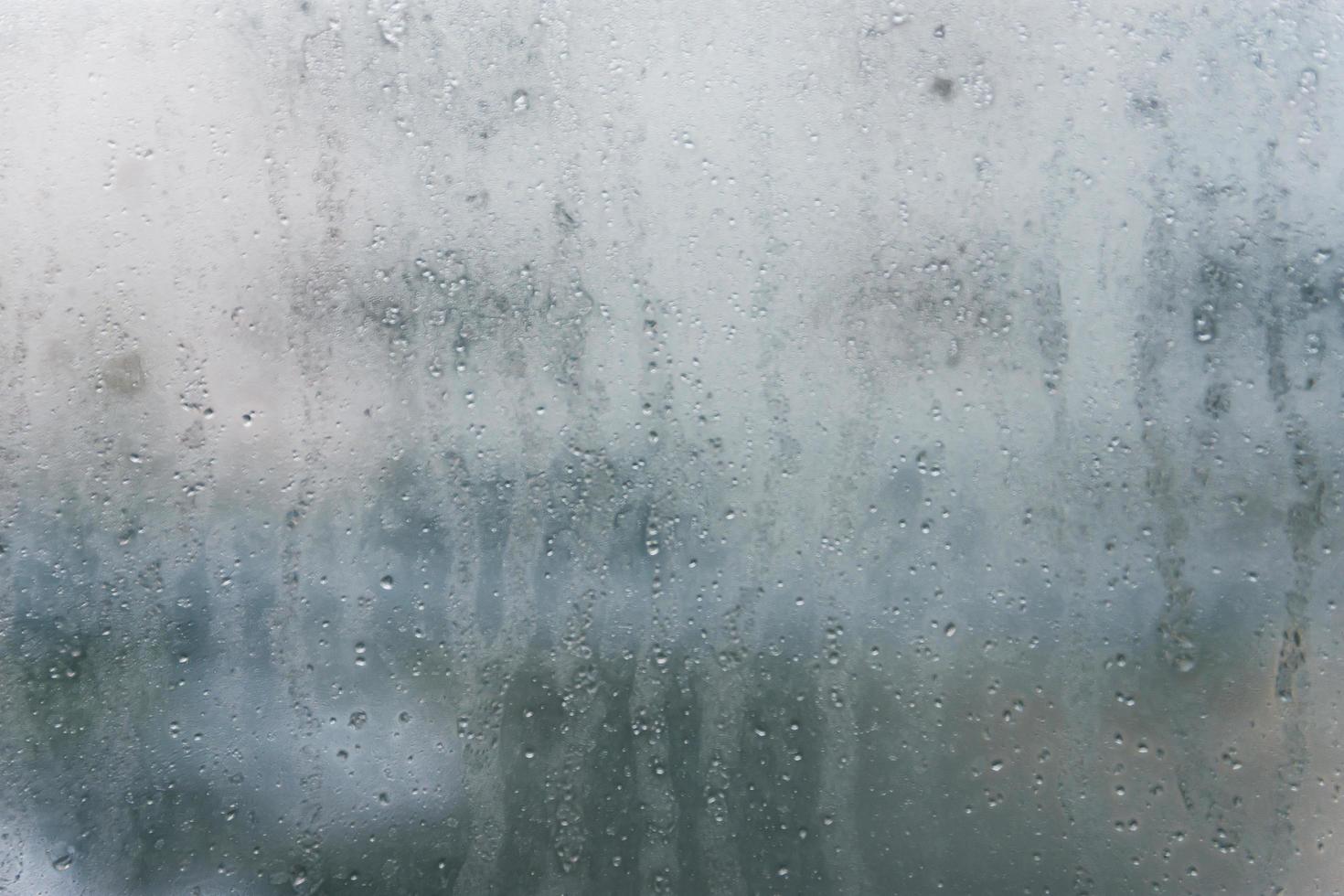 water drops on window glass photo