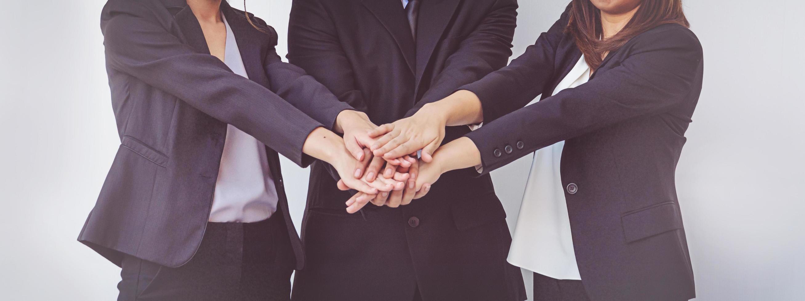 business people coordinate hands. Concept Teamwork photo