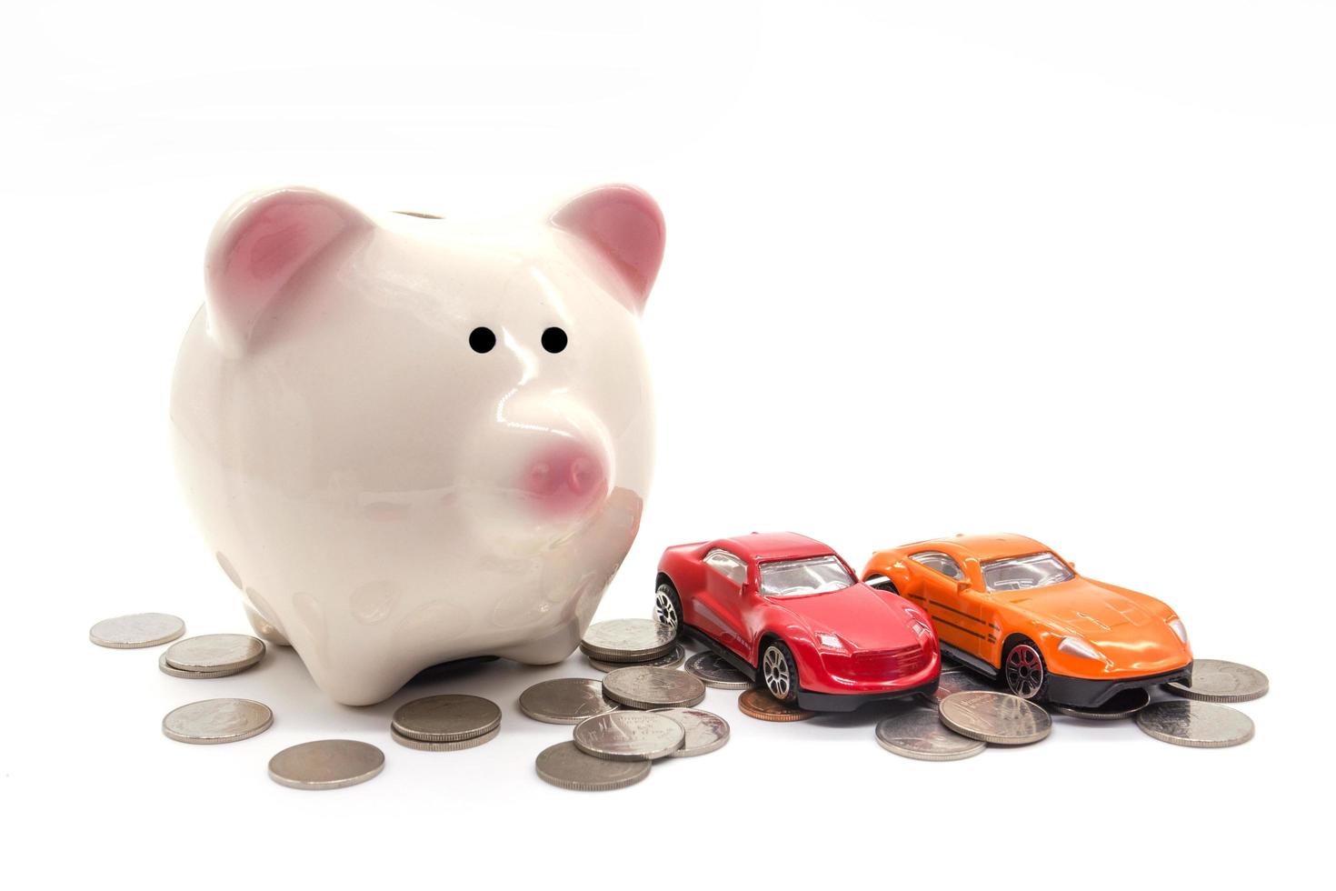 piggy bank with car and coin on white background photo