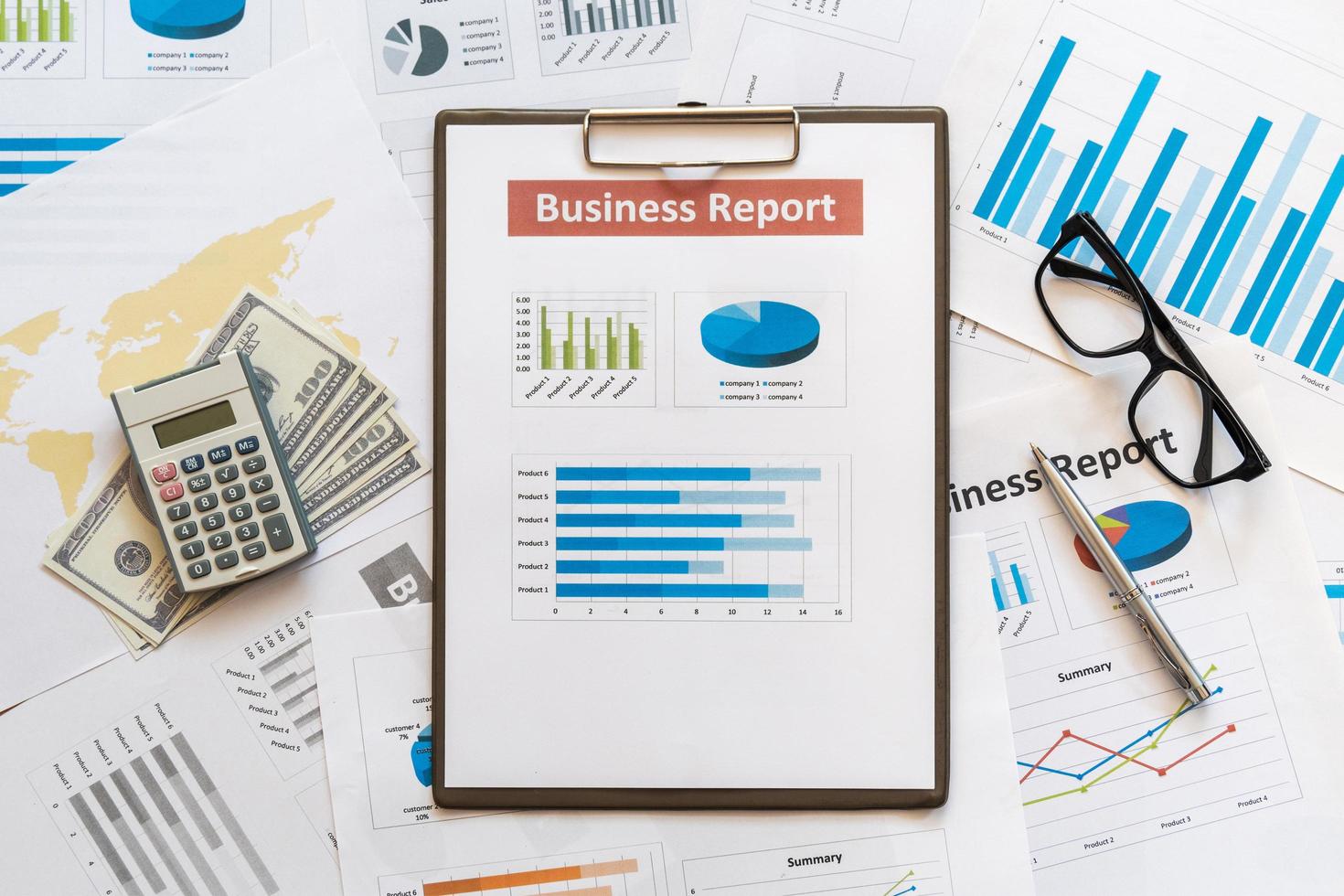 Business report plan put on the desk. data for doing work photo