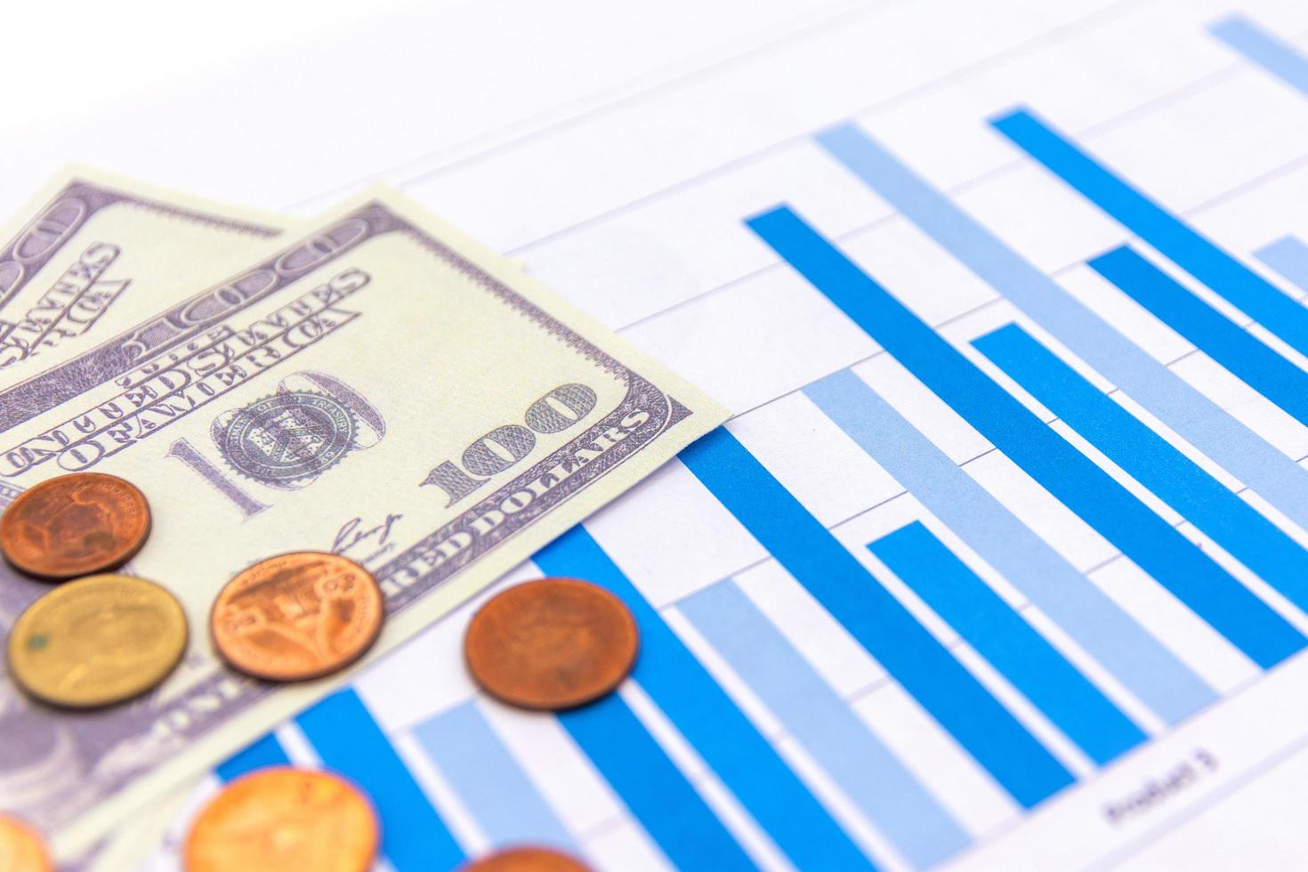 american dollars with graph on white blackground photo