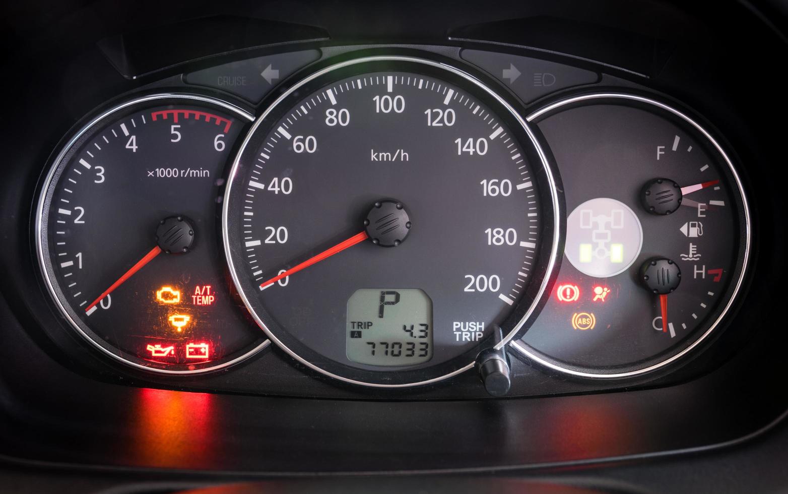 Modern car illuminated dashboard closeup photo