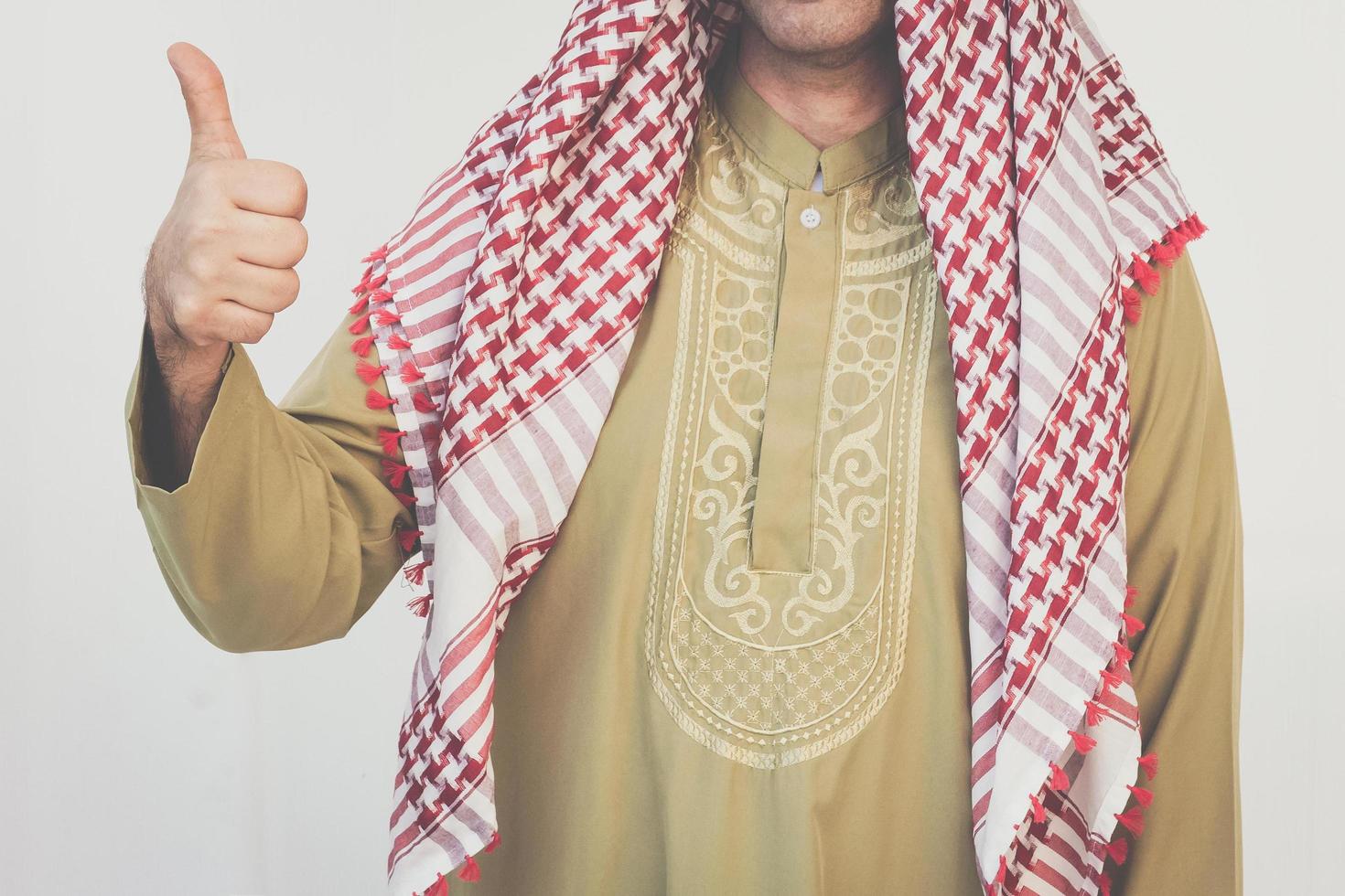 Arab businessman showing thumb photo