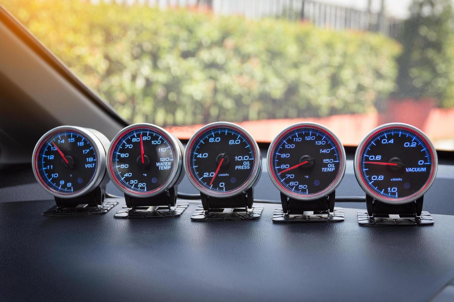 Instrument panel and tachometer from a modern high performance automobile. photo