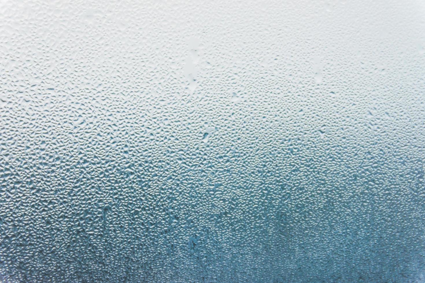 water drops on window glass photo
