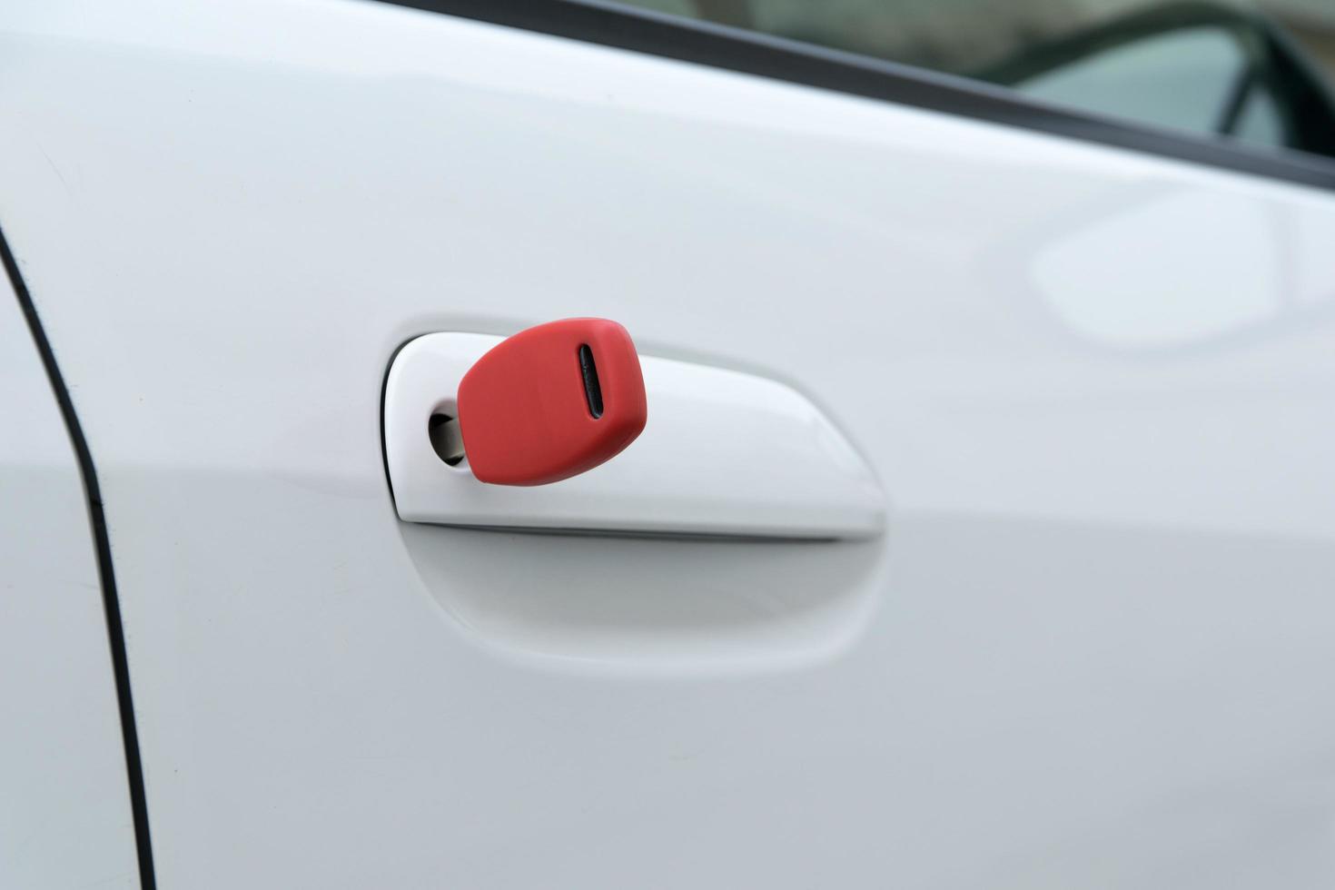 open car door with red key photo