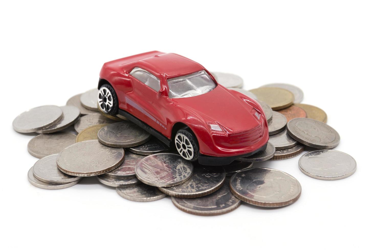 car and coins on white background photo