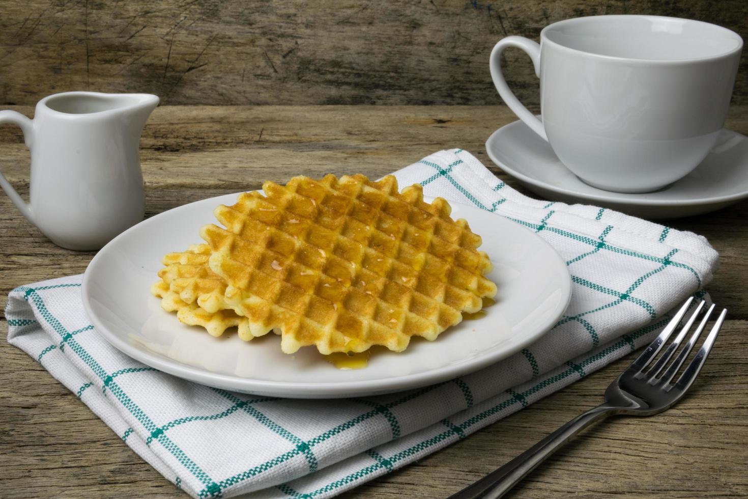 waffle with a cup of Coffee and honey photo