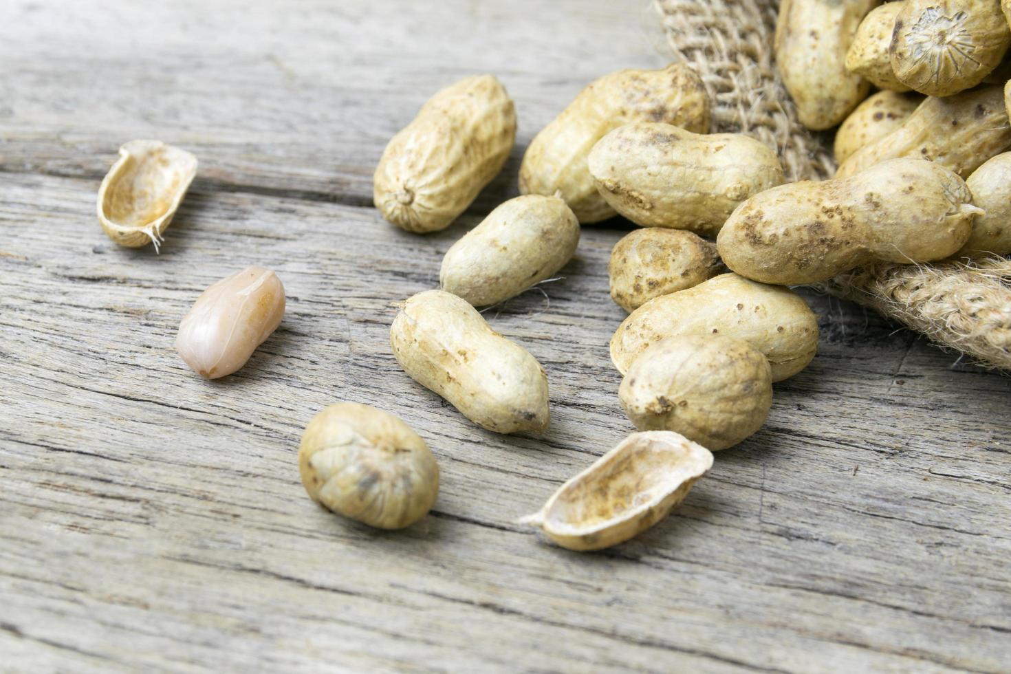 peanut on wooden background photo