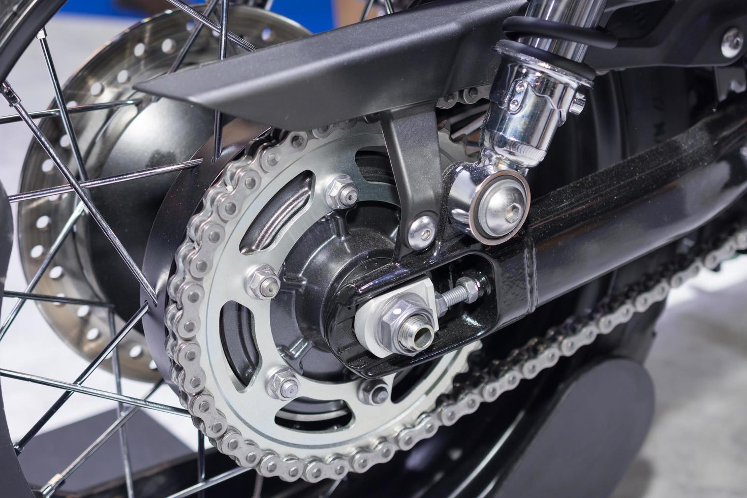 rear chain and sprocket of motorcycle wheel photo