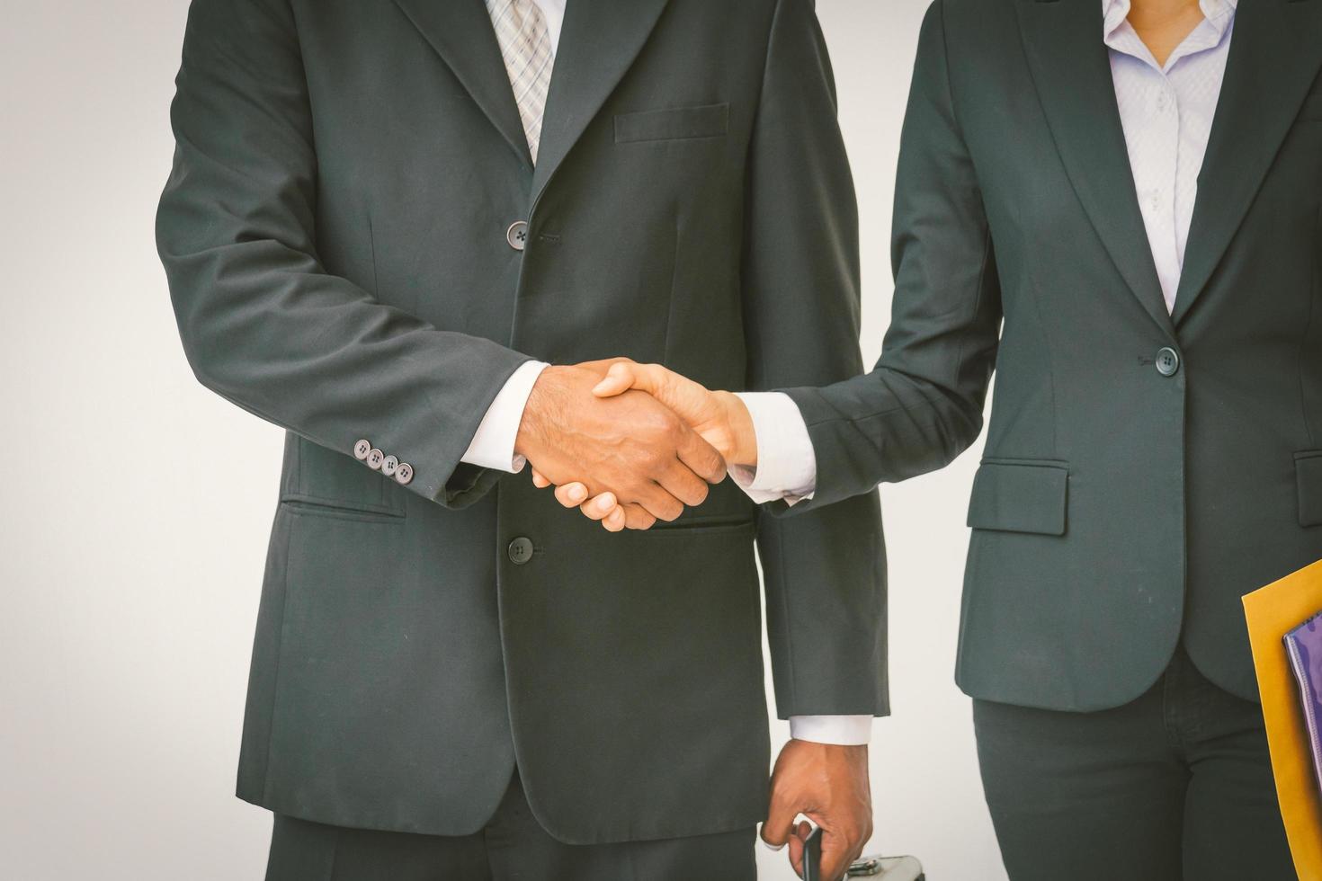 Business partnership meeting concept. Image of businessmen handshake. photo