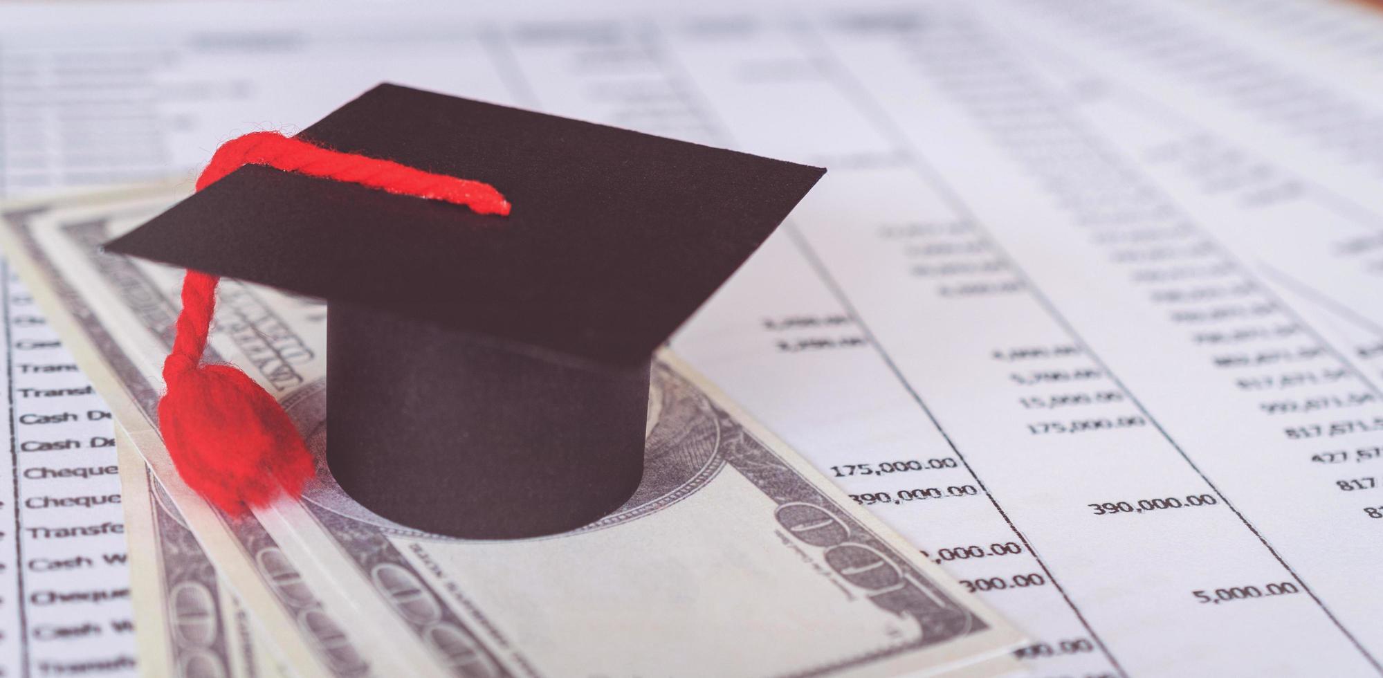 Graduation hat on statement. Statement for education Finance Loan photo