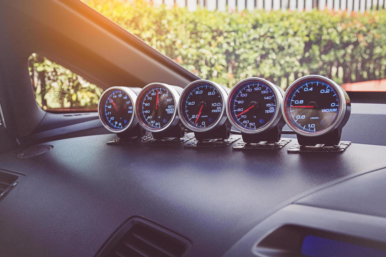 Instrument panel and tachometer from a modern high performance automobile. photo