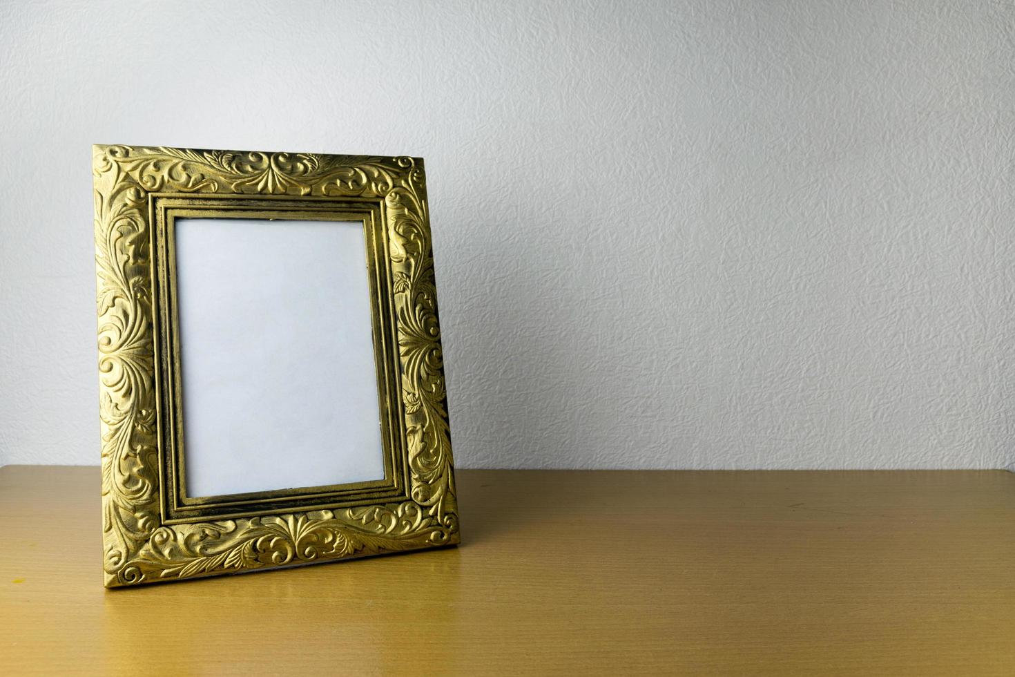 photo frame on wooden table