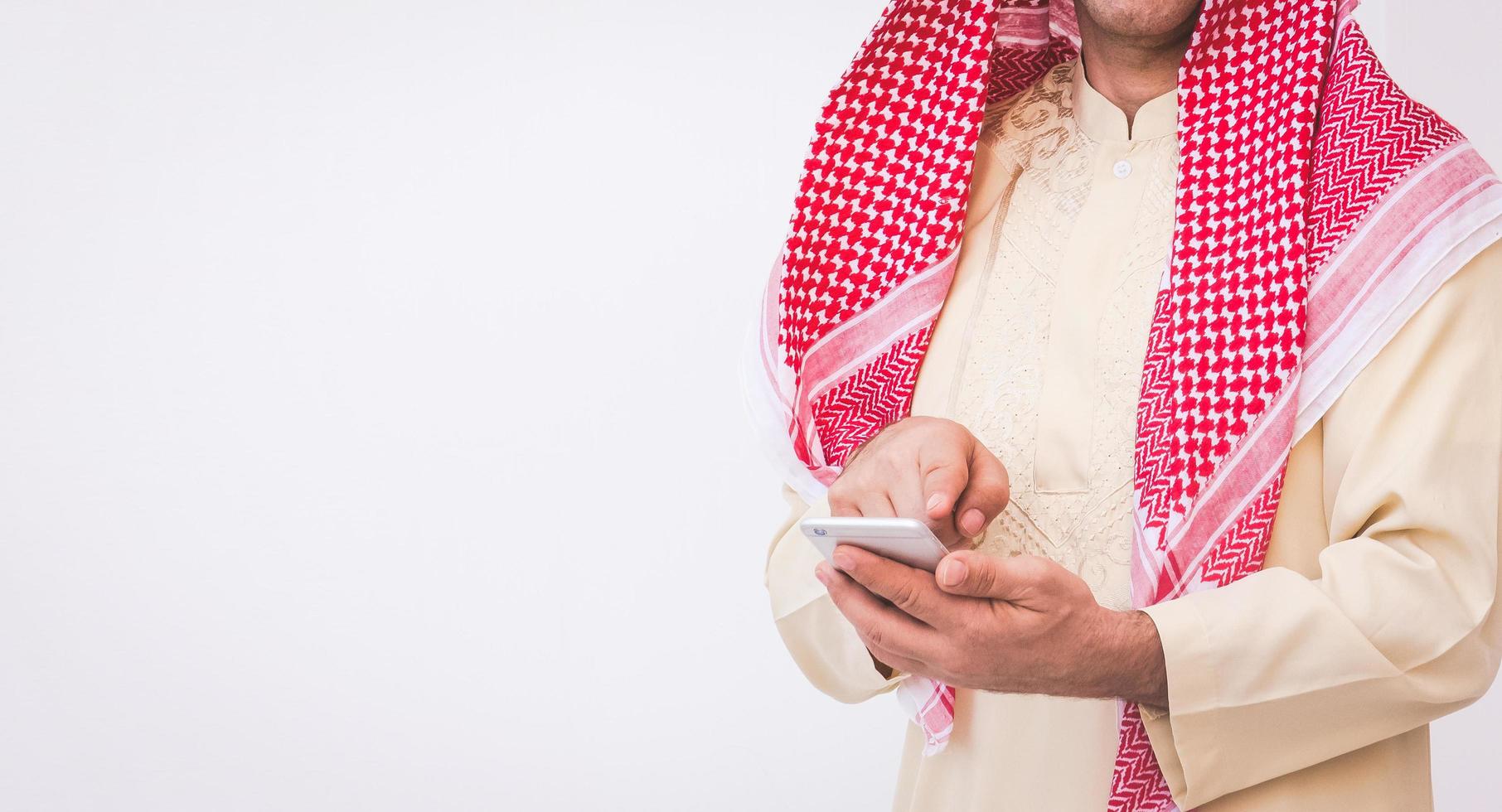Arab businessman useing on a mobile phone photo